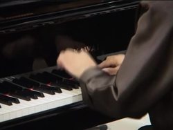 Half brother of president-elect plays piano at charity concert News Clip