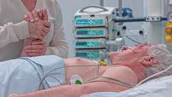 TD Senior woman visiting husband in ICU after surgery Stock Footage