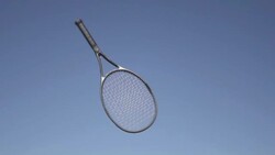 Slow Motion of Tossing Tennis Racket Stock Footage