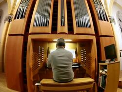 MS TU Organist at church organ playing / Saarburg, Rhineland-Palatinate, Germany Stock Footage