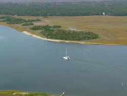 WS AERIAL DS View of boat moving on river / South Carolina, United States Stock Footage