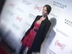 Bono and Damien Hirst Paint the Town Red For Aids In Africa - The (RED) Auction Stock Footage