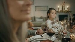 Family sitting on the table for christmas dinner. Stock Footage