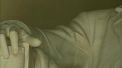 White marble statue of Abraham Lincoln, panning from hand to face Stock Footage