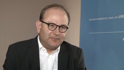 Climate Change panel closing report;interview with head of IPCC News Clip