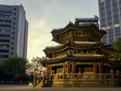 WS T/L Night View of Hwangudan(korea traditional altar) and Chosun Hotel in Jung-gu in Seoul / Seoul, South Korea Stock Footage
