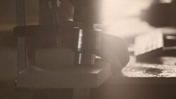 Drilling a hole in wooden block Stock Footage