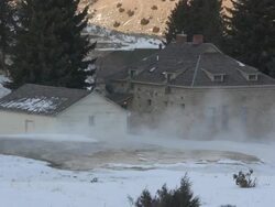 mammoth hot spring yellowstone with building in background. Stock Footage