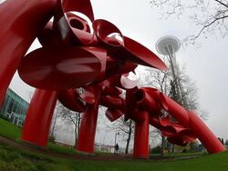 Static view of art sculpture looking up at the Space Needle. Stock Footage