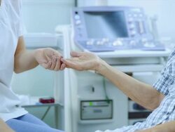Nurse taking blood by fingerstick method Stock Footage