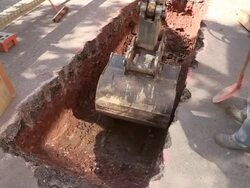 MS Shot of workmen Engraving on street for works at sewage pipe / Saarburg, Rhineland Palatinate, Germany Stock Footage