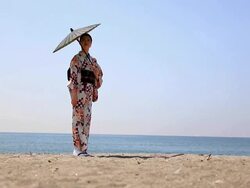 Japanese woman on the beach Stock Footage