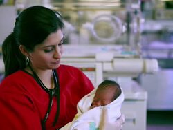 Doctor holds a newborn baby Stock Footage