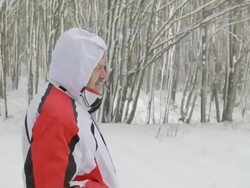 man makes  walk in  winter forest Stock Footage