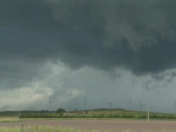 WS T/L View of storm clouds forming over farm / Nebraska, United States Stock Footage