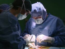  MS Two doctors operating / Cagliari, Sardinia, Italy Stock Footage