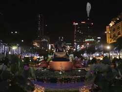 WS LD Decorative Lights Around Statue of Vietnam at Night / Vietnam Stock Footage