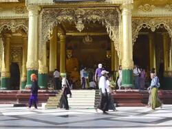 MS Shot of Local people walking around famous Shwedagon Pagoda / Yangon, Yangon Division, Myanmar Stock Footage