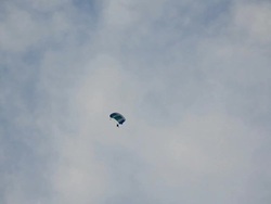 skydiving in blue sky with clouds. Stock Footage