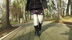 Girl is walking in the park Stock Footage
