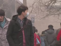 Beijing commuters wearing face masks News Clip