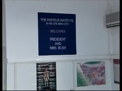 Bush visits stock exchange in Ho Chi Minh City; ADDS visit to Pasteur Institute and vox pops News Clip