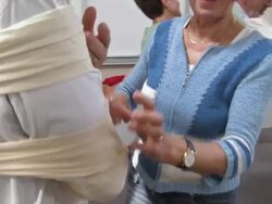 HD: First Aid Students Practicing Arm Immobilization Stock Footage