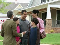WS DS Family Shaking Hands with Realtor in Front of New Home For Sale / Richmond, Virginia, USA Stock Footage