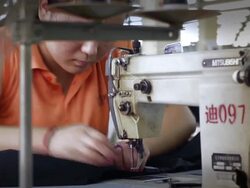 Workers at a Beijing Rontex Garment Factory News Clip
