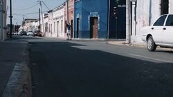 Young adult male rollerblade in urban street Stock Footage