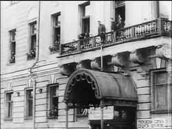 B/W 1917 people standing on balcony of building / Russia / documentary Stock Footage