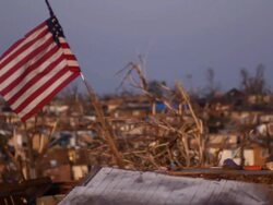 American flag flown in a natural disaster Stock Footage