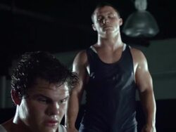 MS TU TD R/F SLO MO Two wrestlers catch their breath on floor mat / Riverside, California, United States Stock Footage