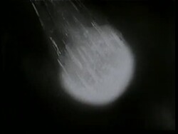 A meteor flies through space toward the Earth. News Clip