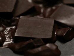 Melting chocolate blocks Stock Footage