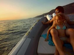 HD Super Slow-Mo: Family Riding In The Motor Boat Stock Footage