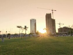 WS View of family playing football on garden at sunset / Buenos Aires, Argentina Stock Footage