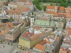 WS AERIAL View of buildings with traffic moving on street / Brno, Brno City District, Czech Republic Stock Footage