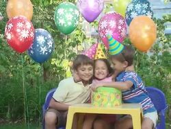 Three child in party hat are happy together Stock Footage