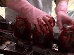 Glass jar with beetroot on conveyor line Stock Footage