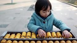 Cute Asian child do arithmetic Stock Footage