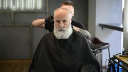 brutal barber clipper mows bearded adult senior hipster Stock Footage