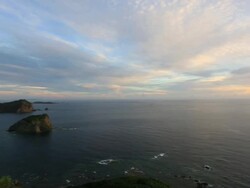WS PAN View of Mikazukiyama Observation deck of Chichi jima island at sunset, UNESCO World Natural Heritage Ogasawara Islands / Ogasawara Islands, Tokyo, Japan Stock Footage