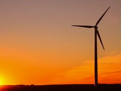 Sun On Horizon With Wind Turbine Silhouette Stock Footage