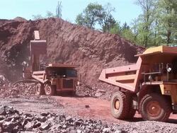 WS Digger and truck working in quarry  / Taben-Rodt, North Rhine- Westphalia, Germany Stock Footage