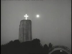 Lights illuminate a cross on top of a rock formation in Forest Lawn Memorial Park. News Clip