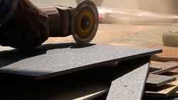 Slow-motion, Electric saw cutting tiles floor Stock Footage