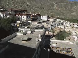 WS HA PAN Shot over roofs of structures in Potal Palace / Lhasa, Tibet, China Stock Footage
