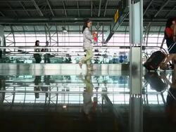 People Walking In The Airport Stock Footage