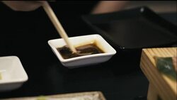 Mixing Wasabi in Soy sauce. Stock Footage